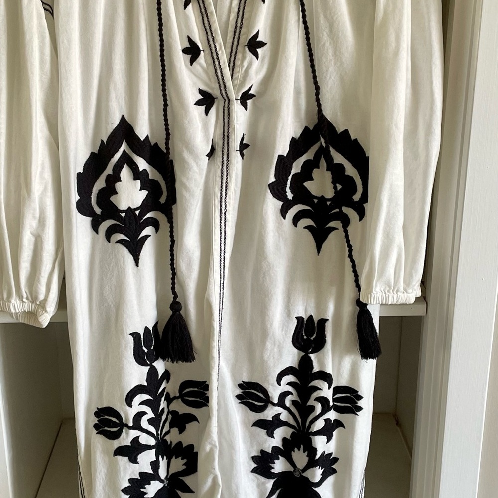 White cotton Zara caftan with black embroidery.